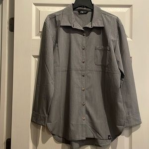 Thinner The North Face blouse. Never worn. Great quality. 30. 1/2 inches long